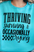 Thriving, Surviving, Crying Unisex NuBlend Crew Sweatshirt