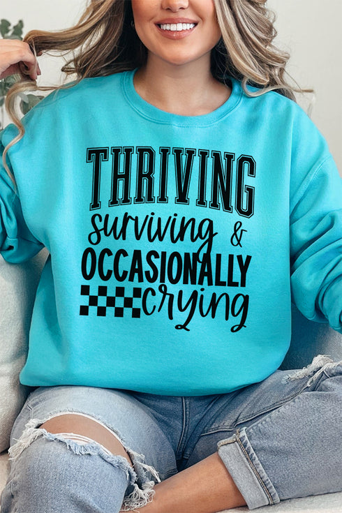 Thriving, Surviving, Crying Unisex NuBlend Crew Sweatshirt