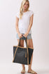 Island Escape Black Two-Tone Woven Straw Tassel Tote