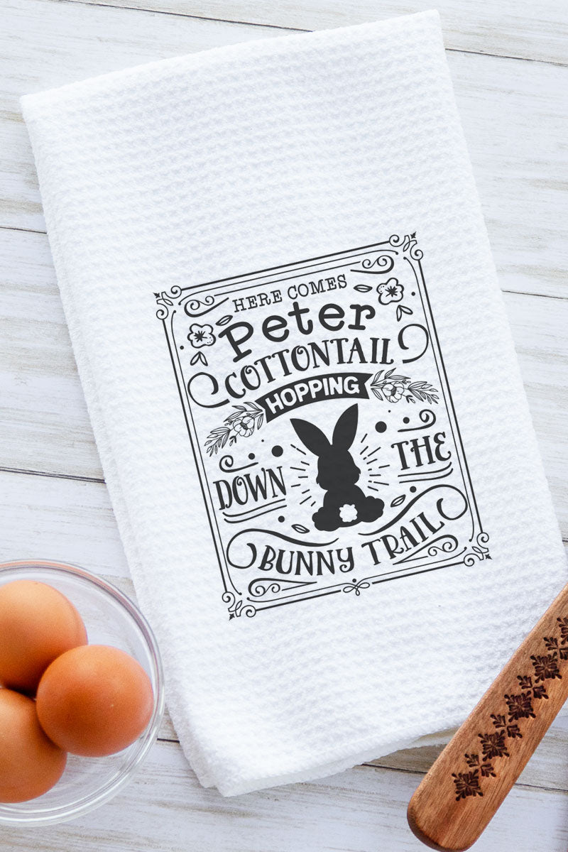 https://howdyhoney.com/cdn/shop/products/waffletowel-herecomespetercottontail_800x.jpg?v=1676328120